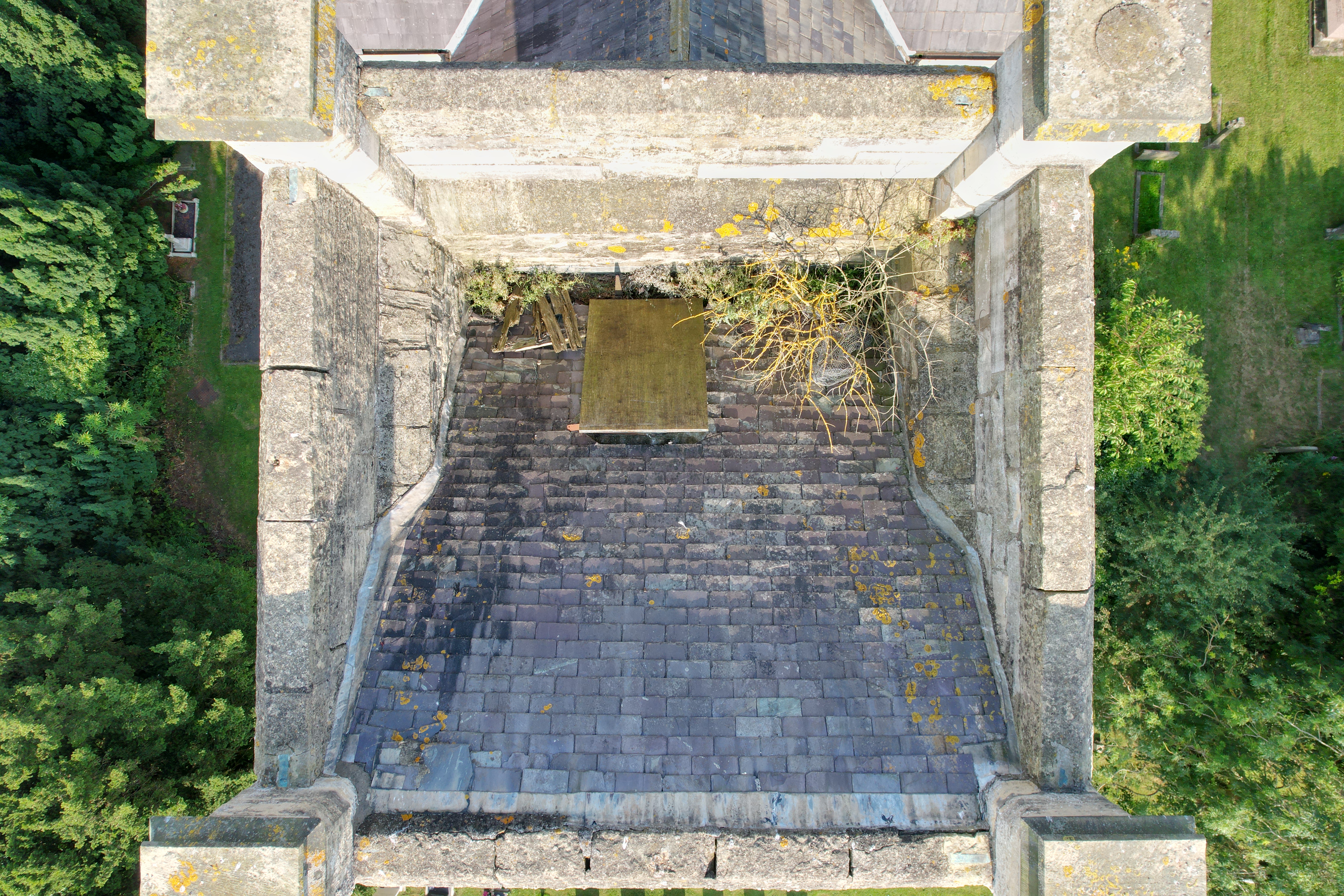 An aerial image of stonework on church tower.
